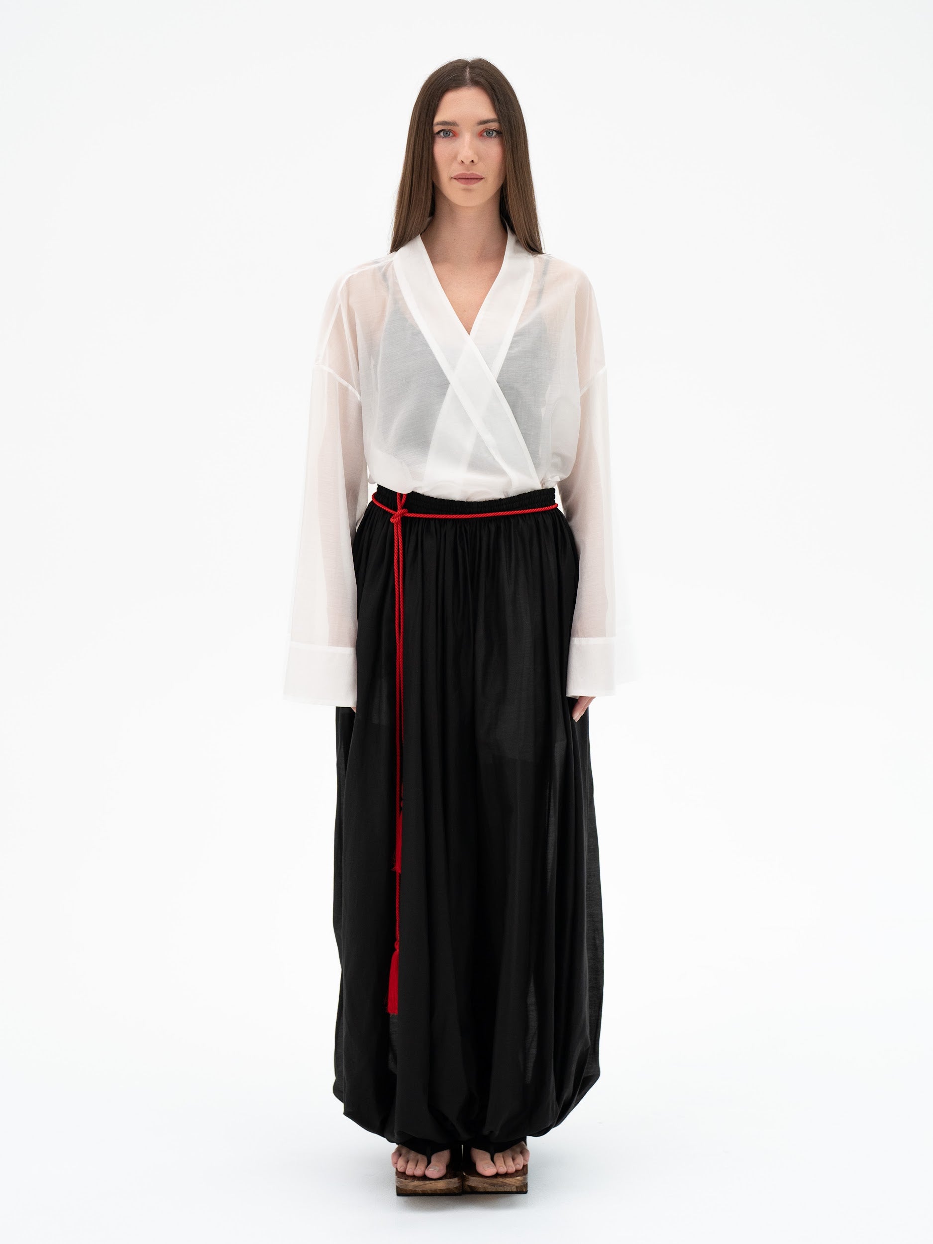black wide leg pants, oversized black trousers, sheer black pants, black palazzo trousers, designer wide leg pants, statement trousers for women, avant-garde womenswear, contemporary designer clothing, luxury women's trousers, Japanese inspired fashion, artistic fashion, oversized pants, elegant black trousers, unique designer pants, Amoriter trousers
