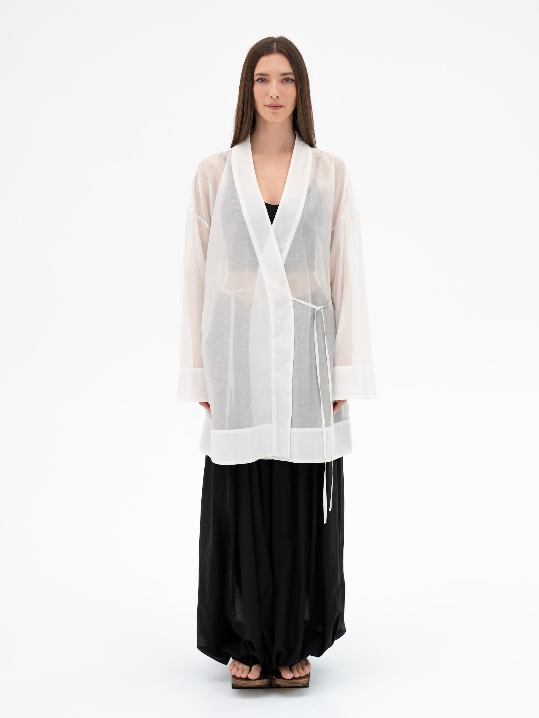 white sheer blouse, white kimono blouse, oversized white blouse, sheer kimono cardigan, designer white blouse, lightweight layering piece, elegant white top, contemporary womenswear, Japanese inspired fashion, luxury women's clothing, minimalist blouse, statement layering piece, Amoriter blouse, kimono sleeve blouse, white oversized top
