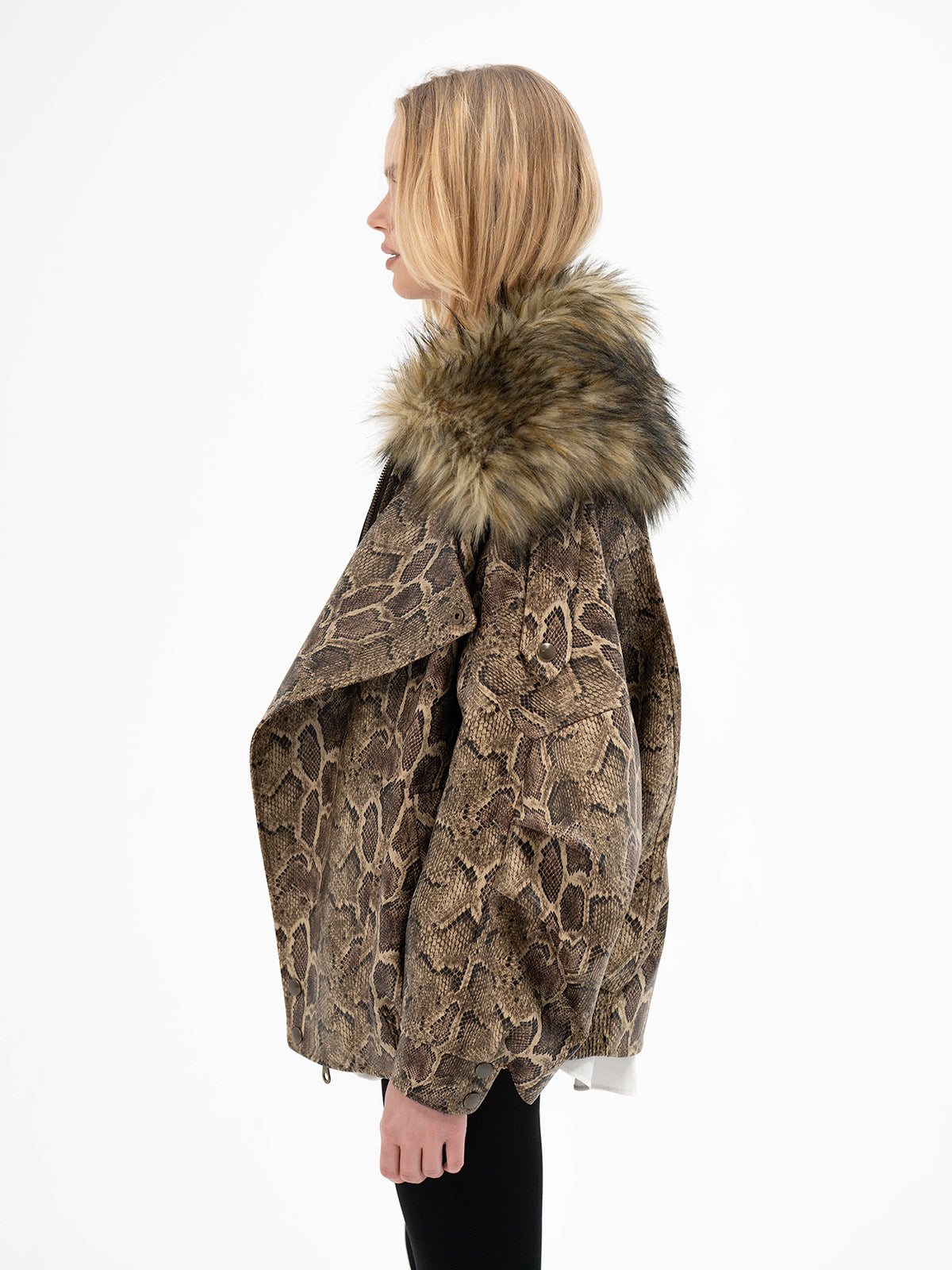 Detachable/oversized faux fur collar for drama and warmth